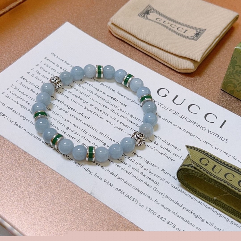 G*u*i bracelets